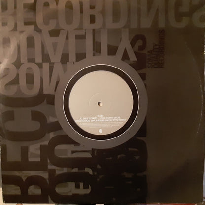 Slam : This World (Remixes) (12", RP, Gen)