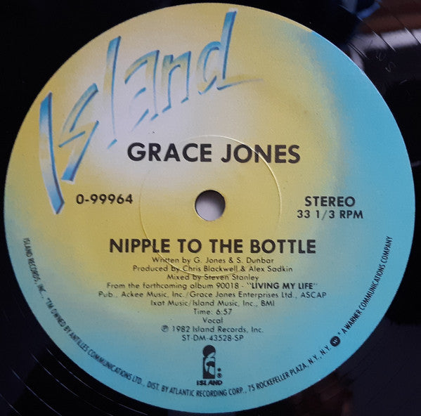 Grace Jones : Nipple To The Bottle (12", Single)