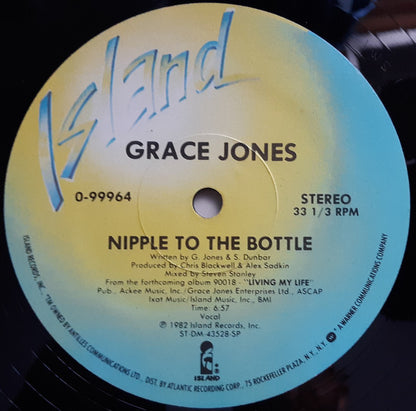 Grace Jones : Nipple To The Bottle (12", Single)