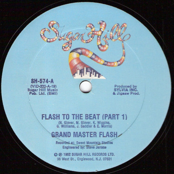 Grand Master Flash* : Flash To The Beat (12", Single)