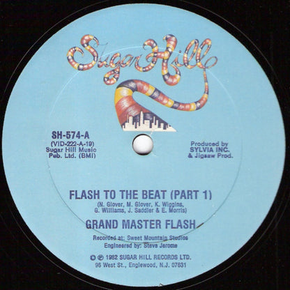 Grand Master Flash* : Flash To The Beat (12", Single)