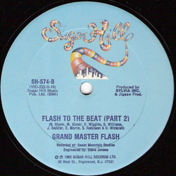 Grand Master Flash* : Flash To The Beat (12", Single)