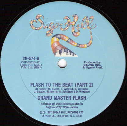 Grand Master Flash* : Flash To The Beat (12", Single)