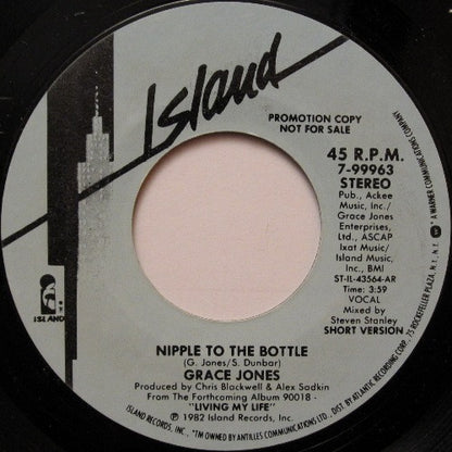 Grace Jones : Nipple To The Bottle (7", Promo)
