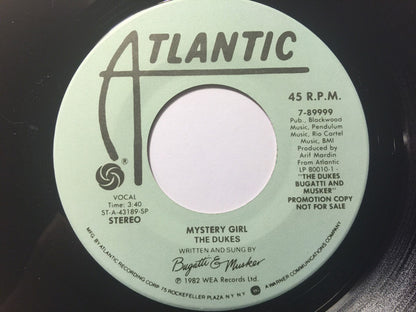 The Dukes (13) : Mystery Girl (7", Promo)