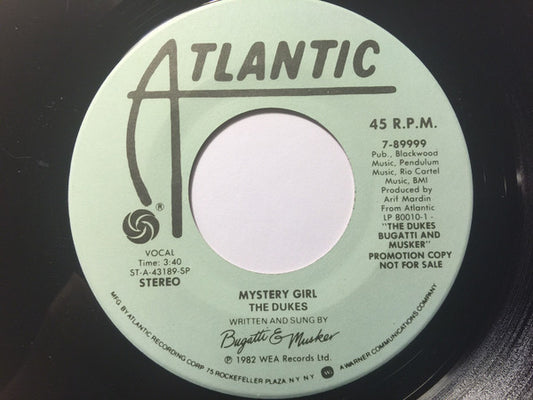 The Dukes (13) : Mystery Girl (7", Promo)